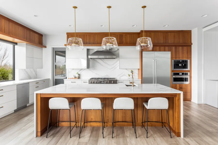 Kitchen Fitters Edinburgh Contemporary Two-Tone Design with Walnut Cabinets and White Quartz Waterfall Island