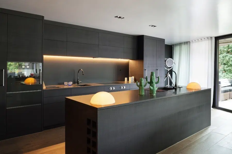 Modern Kitchen Installation in Edinburgh with Sleek Black Cabinets and Minimalist Island